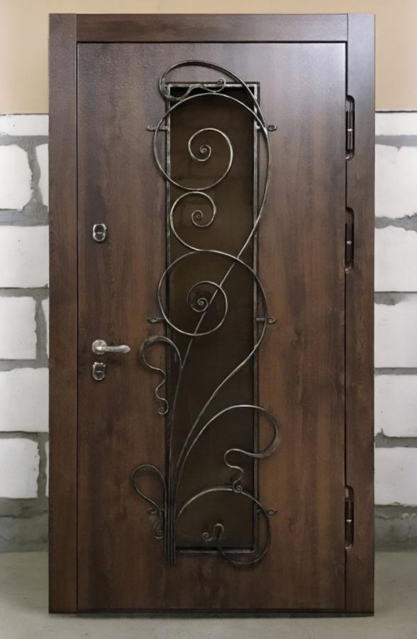 Дверь узорчатой ковкой Дверь узорчатой ковкой